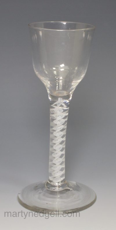 English wine glass with an opaque white spiral in the stem, circa 1780