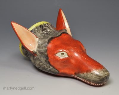 Staffordshire pearlware pottery fox head stirrup cup, circa 1820