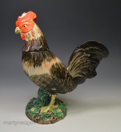 Staffordshire pearlware pottery cockerel decorated with overglaze enamels, circa 1820