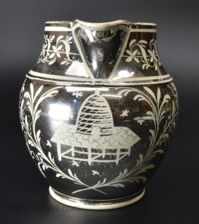 Pearlware jug decorated with bees and beehive in silver resist lustre, circa 1820