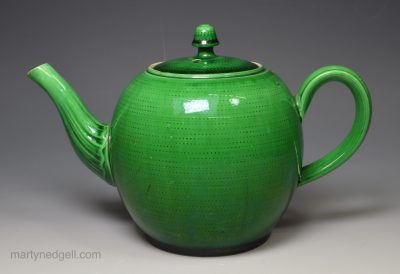 Creamware pottery teapot decorated with green glaze, circa 1770