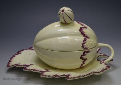 Creamware pottery melon terrine with an integrated stand, circa 1780