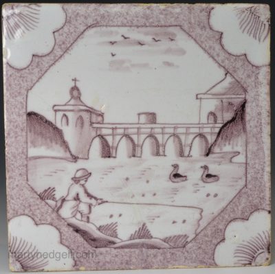 Liverpool delft tile painted in manganese with a fisherman, circa 1750