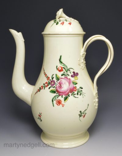 Large creamware pottery coffee pot decorated with floral enamels over the glaze, circa 1780
