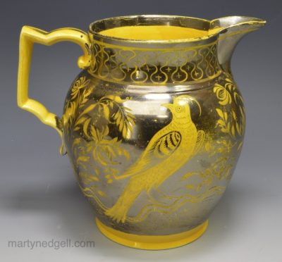 Canary yellow jug decorated with silver resist lustre birds, circa 1820