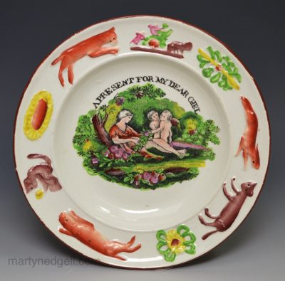 Pearlware pottery child's plate, circa 1820 'A PRESENT FOR MY DEAR GIRL'