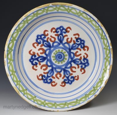 London delft polychrome pancake plate, circa 1720