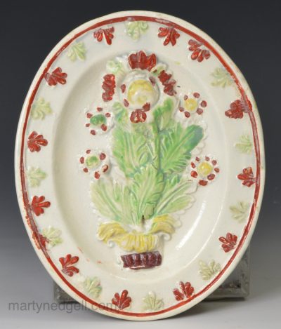 Pearlware pottery toy platter moulded with flowers, circa 1800