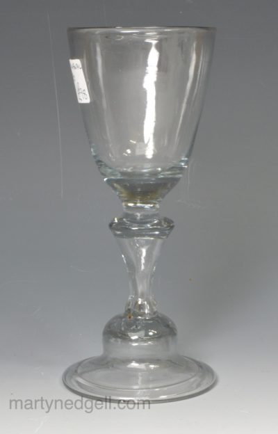 Continental wine glass with pontil, folded foot and knotted stem, circa 1750