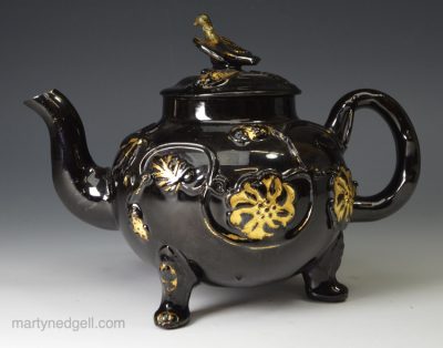 Staffordshire Jackfield black teapot with honey gilding, circa 1770