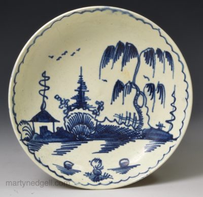 Creamware pottery saucer decorated with blue under the glaze, circa 1790