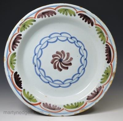 London delft polychrome pancake plate, circa 1740