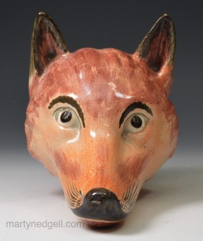 Pearlware pottery fox head stirrup cup, circa 1820
