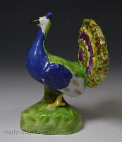 Staffordshire pearlware pottery peacock, circa 1820