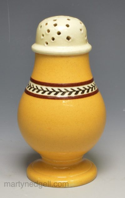 Pearlware pottery paper pot decorated with pumpkin slip, circa 1820