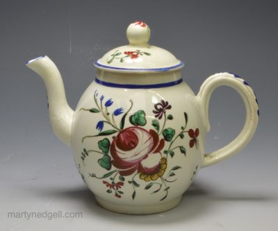 Pearlware pottery toy teapot decorated with florals in colour, circa 1790
