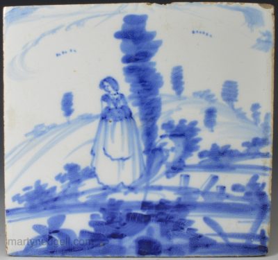Bristol delft tile painted with a woman in blue, circa 1750