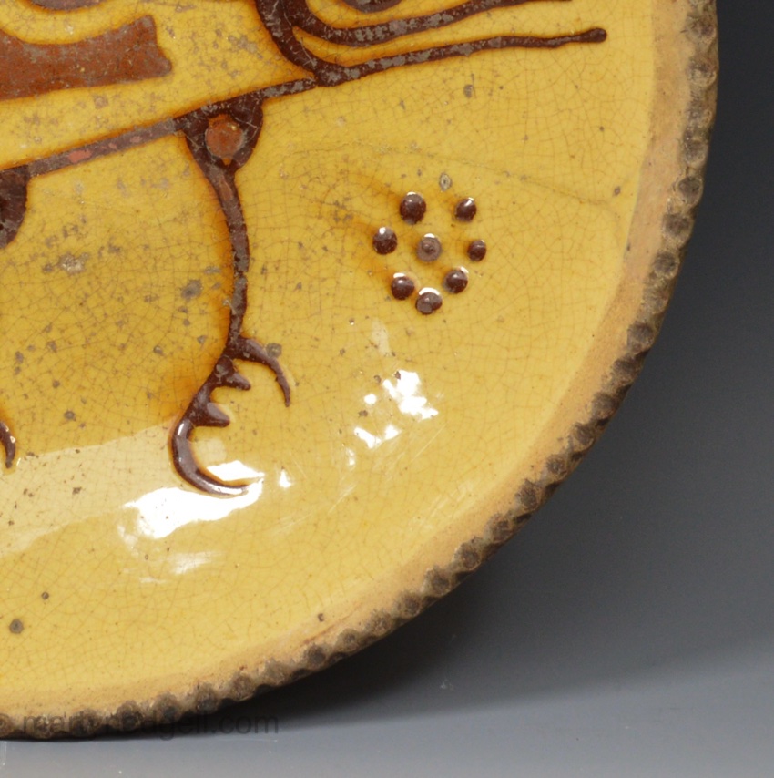 Staffordshire slipware dish with a bird dated 1787