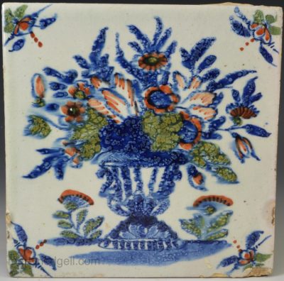 London delft tile, circa 1730 Painted with flowers in red, green and blue