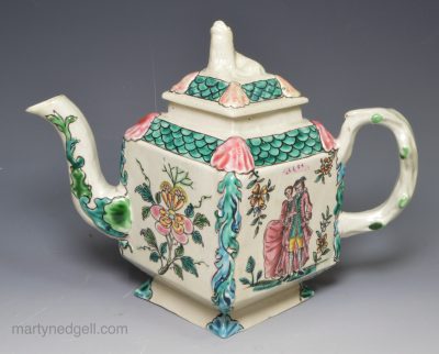 Staffordshire saltglaze stoneware teapot decorated with overglaze enamels, circa 1760