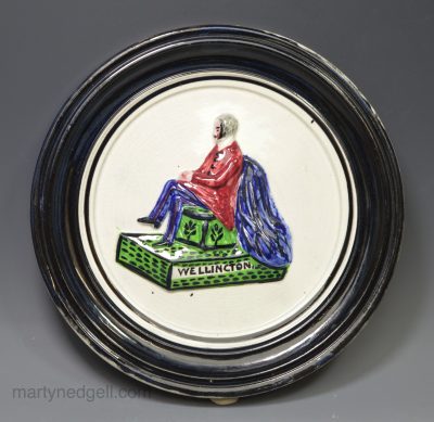 Pearlware pottery plaque moulded with Wellington, circa 1830, probably Scottish pottery