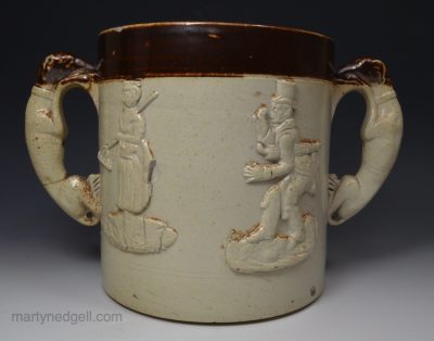Large saltglaze stoneware loving cup, circa 1840 with sprigs of Paul Pry and Madam Vestris