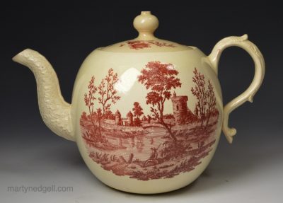 Creamware pottery teapot decorated with Sadler type red prints, circa 1775, probably Wedgwood