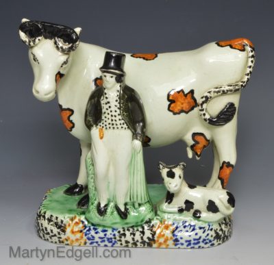 Yorkshire type prattware pottery cow and attendant, circa 1820