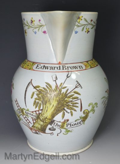 Pearlware pottery jug tinted with 'Edward brown, God speed the plough', circa 1820