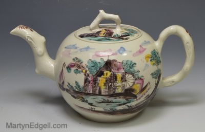 Staffordshire white salt glaze teapot decorated with enamels, circa 1760