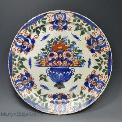 Dutch Delft charger decorated in polychrome florals, circa 1750