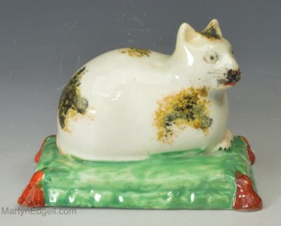 Staffordshire pearlware pottery figure of a cat, circa 1820