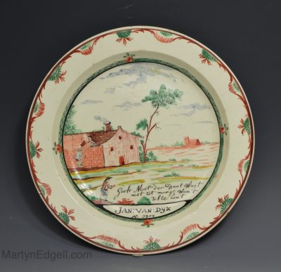 English creamware plate decorated with a dutch painting, circa 1804