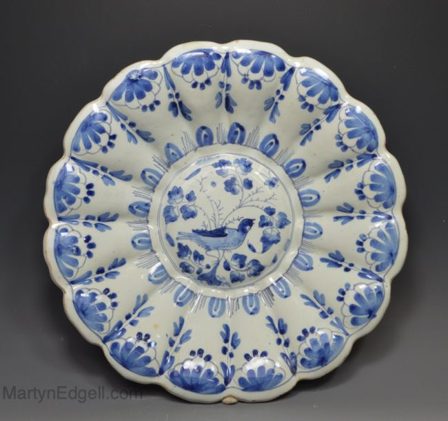 Bristol delft charger decorated with a bird in blue, circa 1690, probably Brislington pottery