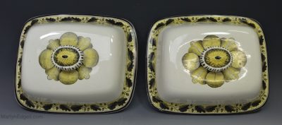 A pair of creamware pottery tureen lids, circa 1800
