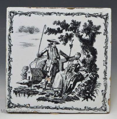 Liverpool delft Sadler tile of a shepherd and shepherdess holding long crooks, circa 1760