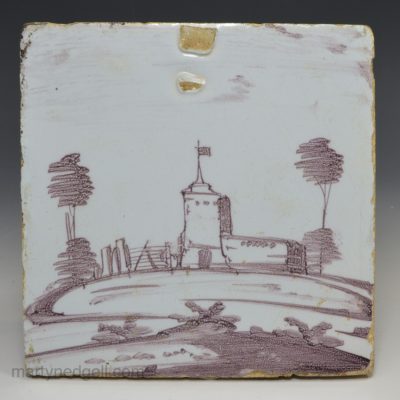 Bristol delft tile decorated with a landscape scene, circa 1750