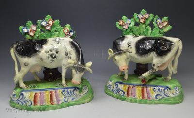 Pair of pearlware pottery sherratt cows, circa 1820