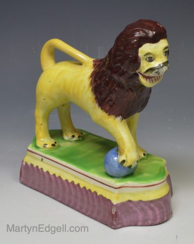 Pearlware pottery figure of a lion, circa 1810