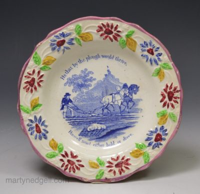 Pearlware pottery child's plate 'He that by the plough would thrive, Himself must either hold or drive', circa 1830
