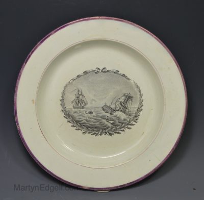 Pearlware pottery plate decorated with a print of the USS Hornet sinking the HMS Peacock, circa 1815