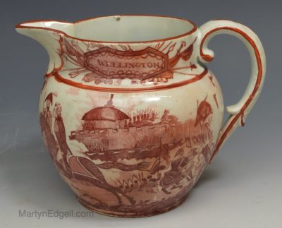 Commemorative pearlware pottery jug decorated with 'WELLINGTON' war scene, circa 1810