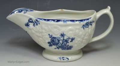 Worcester porcelain sauce boat printed with florals, circa 1770