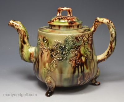 Creamware pottery teapot decorated Whieldon type colours, circa 1770