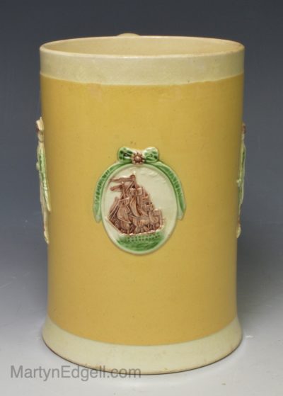 Creamware pottery mug commemorating the battle of the Saints moulded with Admiral Rodney and Admiral Sir Samuel Hood, circa 1785