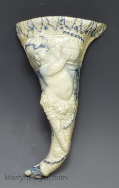 Creamware pottery wall pocket painted with blue under the glaze, circa 1790