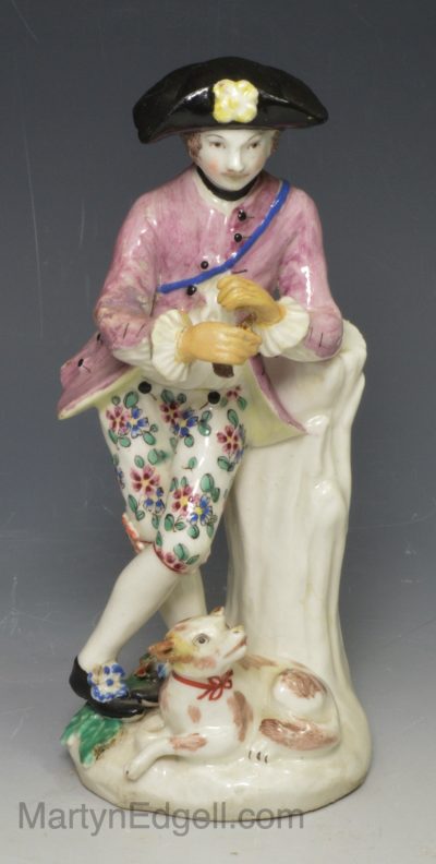 Bow porcelain figure of a man and a dog, circa 1775