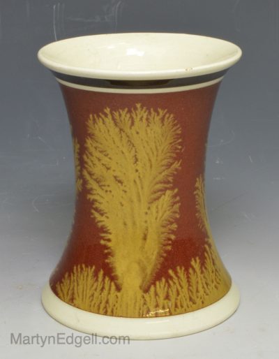 Mochaware pottery spill vase decorated with a dendritic design, circa 1820