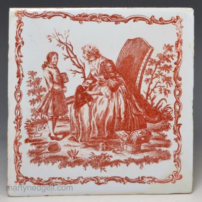 Liverpool delft Sadler printed tile of a nursemaid brushing a boy's hat, circa 1770