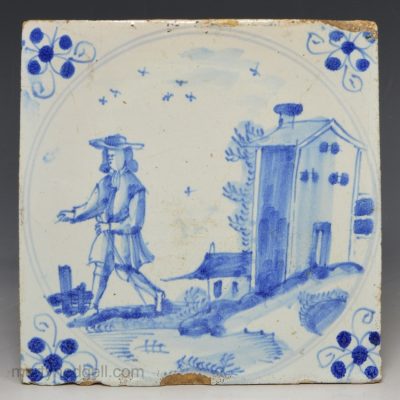 London delft tile painted with a man in blue, circa 1700